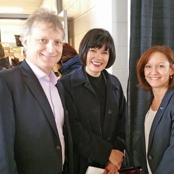 Minister board members smiling