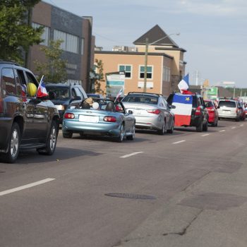 Cars parading on the street