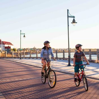 People biking at the Moncton Riverfront