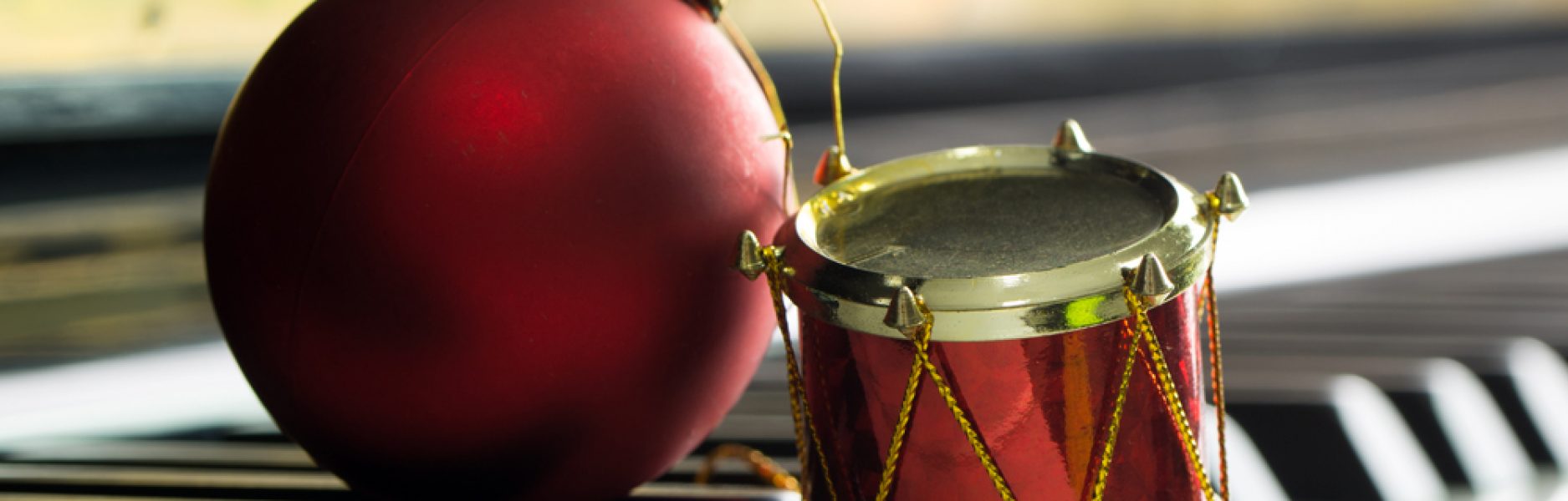 christmas ornament on piano keys