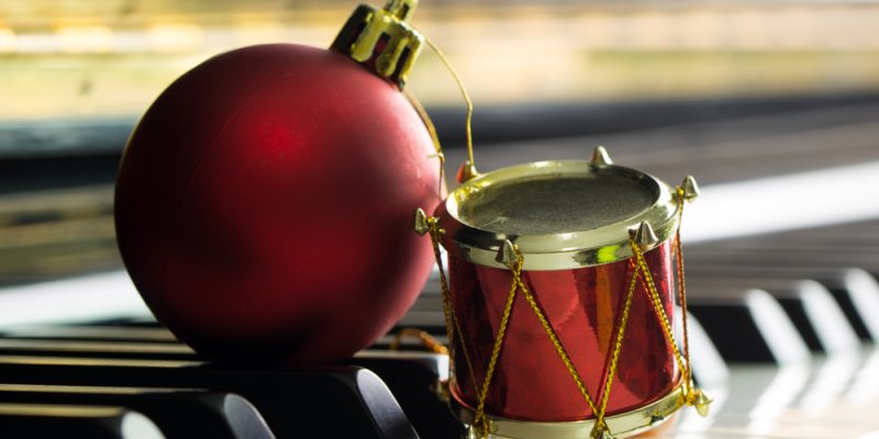 christmas ornament on piano keys