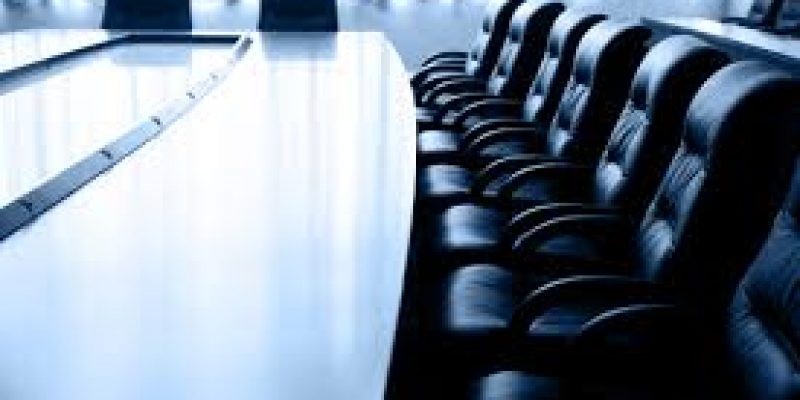chairs lined up in a board room